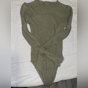 Turtle neck bodysuit.